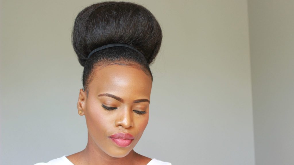 An Easy To Style Natural Hair Bun Using Braiding Hair For Black Women